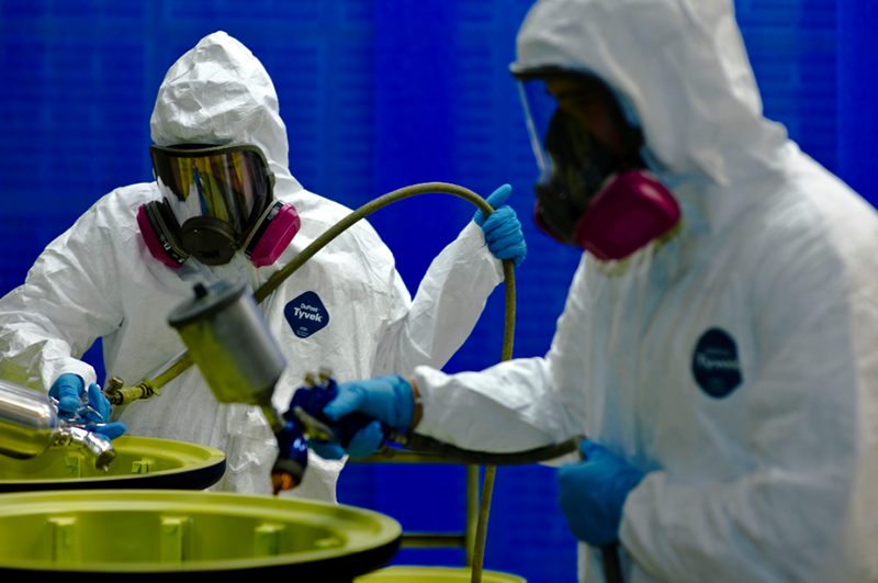 workers using spray paints